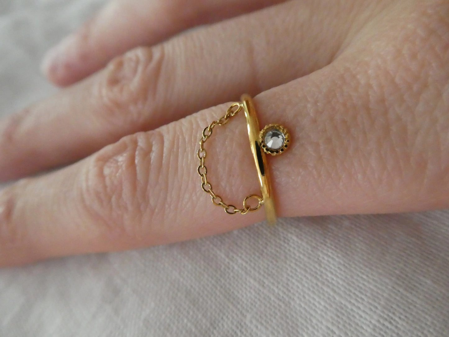 Bague acier doré et strass