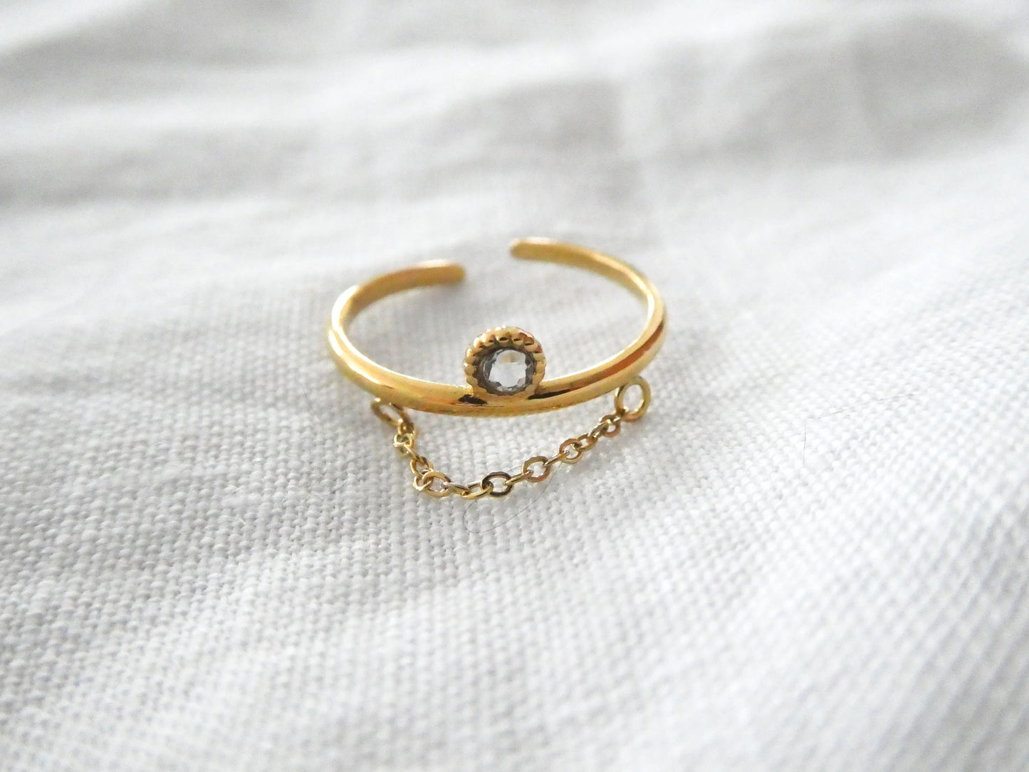 Bague acier doré et strass
