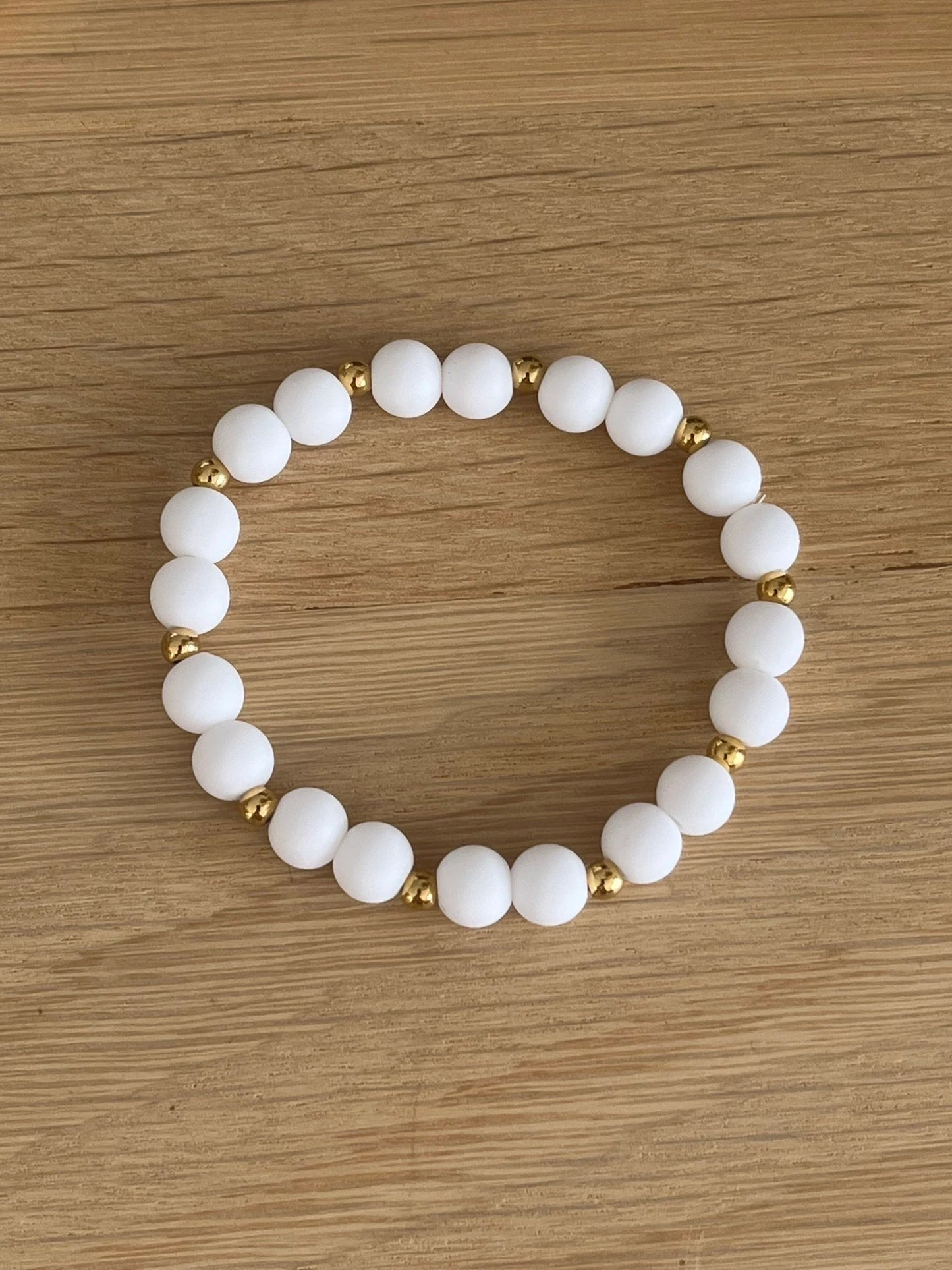 Bracelet élastique - perles acrylique et acier doré