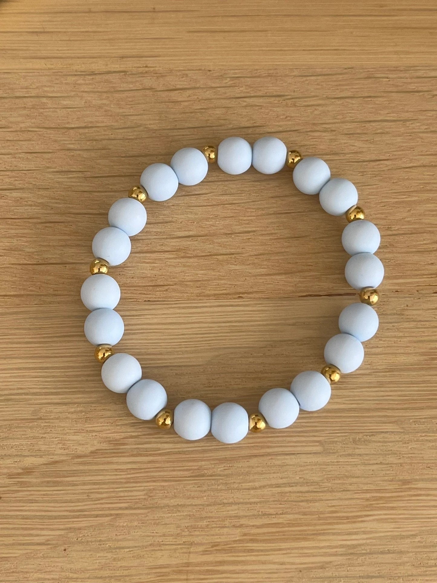 Bracelet élastique - perles acrylique et acier doré