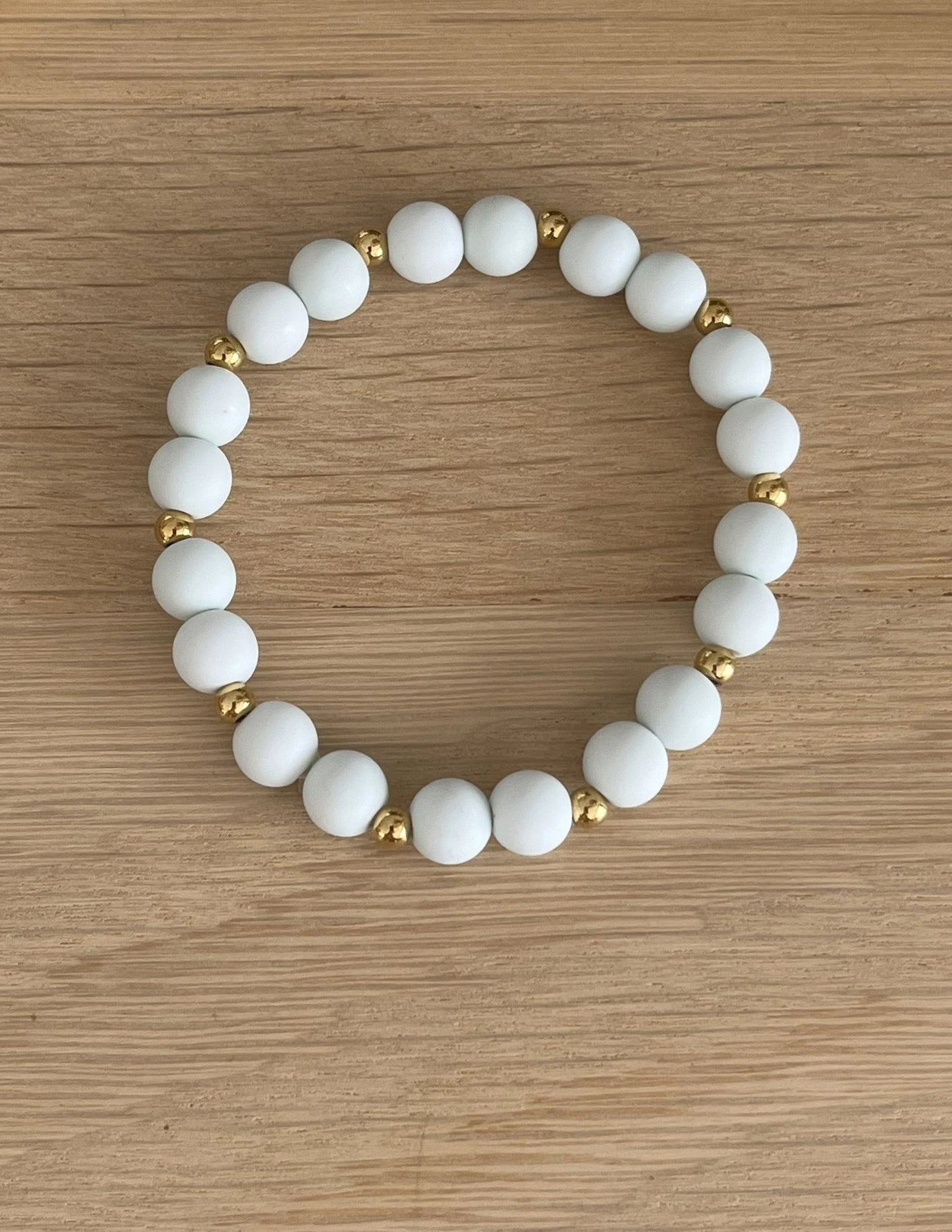 Bracelet élastique - perles acrylique et acier doré