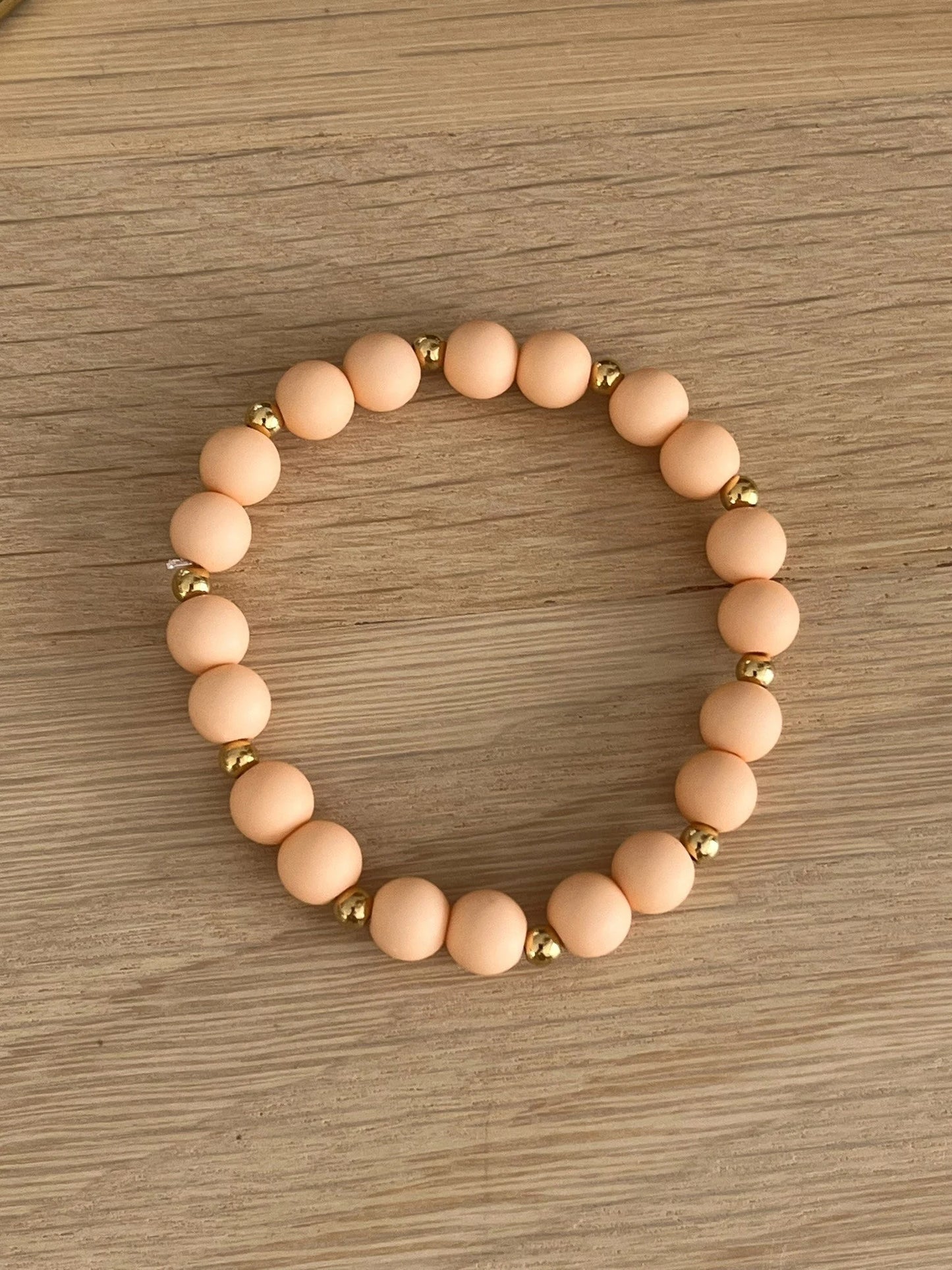 Bracelet élastique - perles acrylique et acier doré