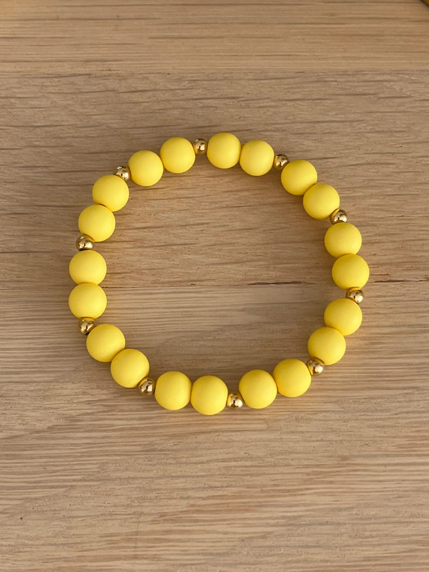 Bracelet élastique - perles acrylique et acier doré